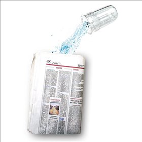 Liquid In The Newspaper